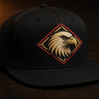 Black snapback with embroidered eagle crest